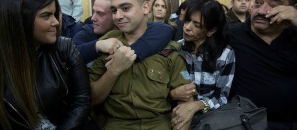 Israeli soldier Elor Azaria, who is charged with manslaughter by the Israeli military, sits to hear his verdict in a military court in Tel Aviv, Israel, January 4, 2017 - Sputnik International