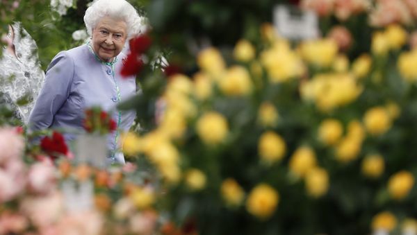 Britain's Queen Elizabeth II, walks amongst the floral displays - Sputnik International