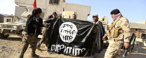 Iraqi Army soldiers celebrate as they hold a flag of the Islamic State group they captured during a military operation to regain control of a village outside Mosul, Iraq (File) Iraqi Army soldiers celebrate as they hold a flag of the Islamic State group they captured during a military operation to regain control of a village outside Mosul, Iraq (File) - Sputnik International