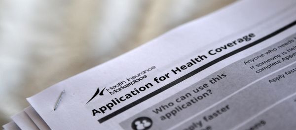 The federal government forms for applying for health coverage are seen at a rally held by supporters of the Affordable Care Act, widely referred to as Obamacare, outside the Jackson-Hinds Comprehensive Health Center in Jackson, Mississippi, U.S. (File) - Sputnik International