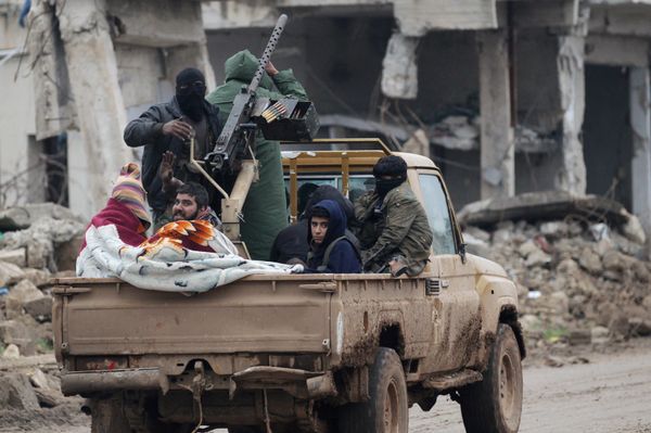 Rebel fighters ride on a pick-up truck in the northern Syrian rebel-held town of al-Rai, Syria January 5, 2017 Rebel fighters ride on a pick-up truck in the northern Syrian rebel-held town of al-Rai, Syria January 5, 2017 - Sputnik International