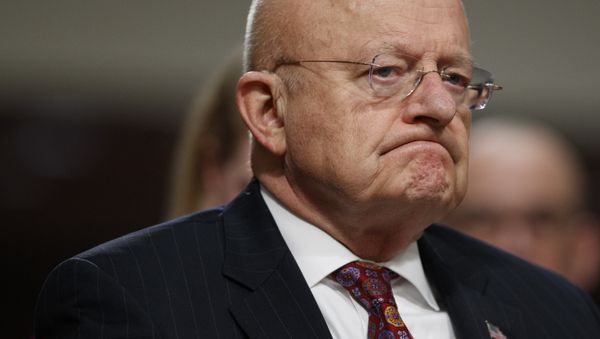 Director of National Intelligence James Clapper listens while testifying on Capitol Hill in Washington, Thursday, Jan. 5, 2017, before the Senate Armed Services Committee hearing: Foreign Cyber Threats to the United States. Director of National Intelligence James Clapper listens while testifying on Capitol Hill in Washington, Thursday, Jan. 5, 2017, before the Senate Armed Services Committee hearing: Foreign Cyber Threats to the United States. - Sputnik International