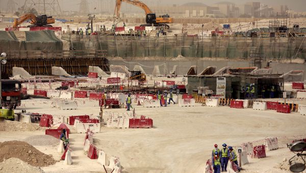 Laborers work at the Al-Wakra Stadium that is under construction for the 2022 World Cup, in Doha, Qatar (File) Laborers work at the Al-Wakra Stadium that is under construction for the 2022 World Cup, in Doha, Qatar (File) - Sputnik International
