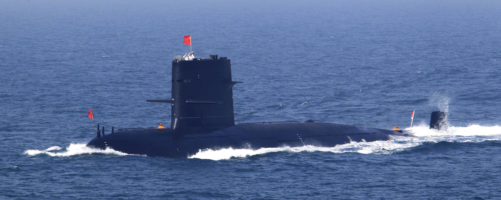 In this April 26, 2012 file photo released by China's Xinhua News Agency, Chinese navy's submarine attends the fleet review of the China-Russia joint naval exercise in the Yellow Sea - Sputnik International, 1920, 15.05.2023