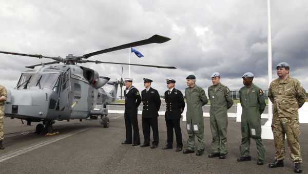 British forces' personnel stand to attention in front of a new AgustaWestland AW159 Wildcat helicopter at the Farnborough International Airshow in Farnborough, England (file) British forces' personnel stand to attention in front of a new AgustaWestland AW159 Wildcat helicopter at the Farnborough International Airshow in Farnborough, England (file) - Sputnik International