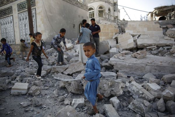 In this Sept. 8, 2015 file photo, children play amid the rubble of a house destroyed by a Saudi-led airstrike in Sanaa, Yemen In this Sept. 8, 2015 file photo, children play amid the rubble of a house destroyed by a Saudi-led airstrike in Sanaa, Yemen - Sputnik International