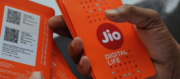 A customer selects a new SIM card at Reliance Jio Infocomm 4G mobile services in Mumbai on 6 September 2016 A customer selects a new SIM card at Reliance Jio Infocomm 4G mobile services in Mumbai on 6 September 2016 - Sputnik International