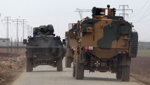 Turkish military vehicles drive in the Syrian rebel-held town of al-Rai, as they head towards the northern Syrian town of al-Bab, Syria January 4, 2017 - Sputnik International