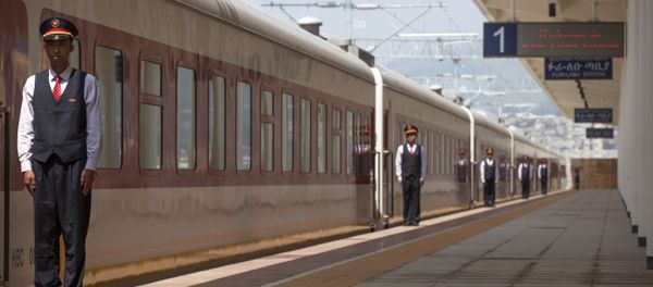 Chinese employees of the Addis Ababa / Djibouti train line stand at the Feri train station in Addis Ababa on September 24, 2016. With Chinese conductors at the helm, a fleet of shiny new trains will on October 5, 2016 begin plying a new route from the Ethiopian capital to Djibouti, in a major boost to both economies - Sputnik International