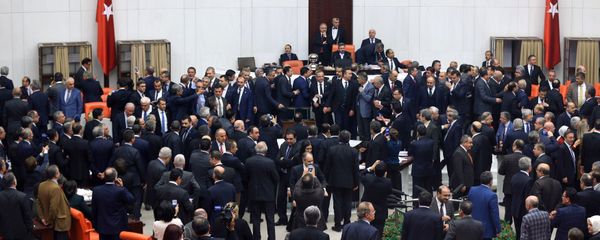 Turkish lawmakers cast their votes during a debate for a proposal for change in the constitution on January 10, 2017 at the Turkish parliament in Ankara. Turkey's parliament on January 9, 2017 began debating a controversial new draft constitution aimed at expanding the powers of the presidency under Recep Tayyip Erdogan - Sputnik International