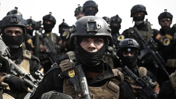 In this Saturday, Aug. 13, 2016 file photo, a soldier from the 1st Battalion of the Iraqi Special Operations Forces listens to an address by his commander after a training exercise to prepare for the operation to re-take Mosul from Islamic State militants, in Baghdad, Iraq - Sputnik International
