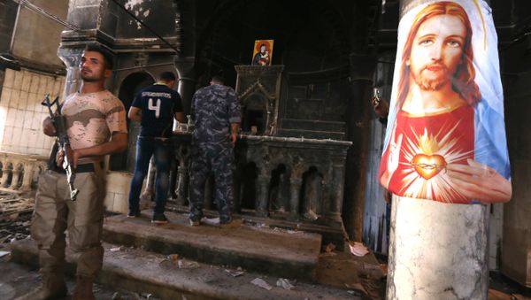 Iraqi Christian forces inspect the damage at the Church of the Immaculate Conception on October 30, 2016 in the town of Qaraqosh (also known as Hamdaniya), 30 kms east of Mosul, after Iraqi forces recaptured it from Islamic State (IS) group jihadists. - Sputnik International