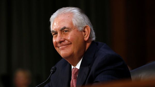 Rex Tillerson, the former chairman and chief executive officer of Exxon Mobil, smiles during his testimony before a Senate Foreign Relations Committee confirmation hearing on his nomination to be U.S. secretary of state in Washington, U.S. January 11, 2017 - Sputnik International