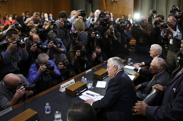 Rex Tillerson (C), former chairman and chief executive officer of Exxon Mobil, is seated prior to testifying before a Senate Foreign Relations Committee confirmation hearing on his nomination to be U.S. secretary of state, on Capitol Hill in Washington, U.S. January 11, 2017 - Sputnik International