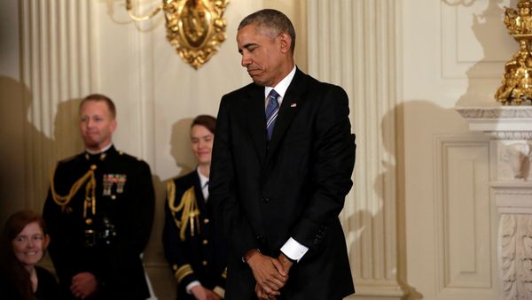 U.S. President Barack Obama reacts after presenting the Presidential Medal of Freedom to Vice President Joe Biden (not pictured) in the State Dining Room of the White House in Washington, U.S., January 12, 2017 U.S. President Barack Obama reacts after presenting the Presidential Medal of Freedom to Vice President Joe Biden (not pictured) in the State Dining Room of the White House in Washington, U.S., January 12, 2017 - Sputnik International