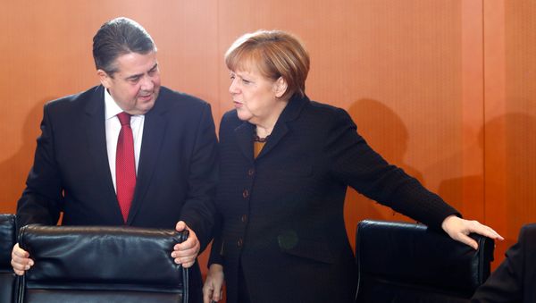 German Economy Minister Sigmar Gabriel and Chancellor Angela Merkel attend a cabinet meeting at the Chancellery in Berlin, Germany, January 11, 2017 German Economy Minister Sigmar Gabriel and Chancellor Angela Merkel attend a cabinet meeting at the Chancellery in Berlin, Germany, January 11, 2017 - Sputnik International