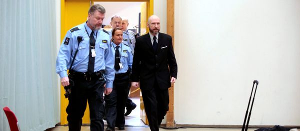 Anders Behring Breivik (R) is escorted by police officers to the courtroom on the fourth day of the appeal case in Borgarting Court of Appeal at Telemark prison in Skien, Norway, January 13, 2017 - Sputnik International