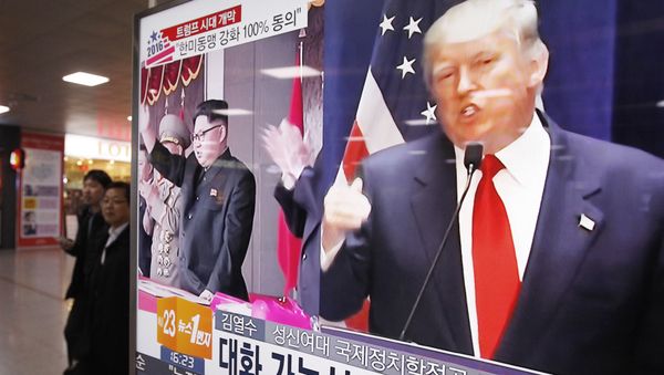 A TV screen shows pictures of U.S. President-elect Donald Trump, right, and North Korean leader Kim Jong Un, at the Seoul Railway Station in Seoul, South Korea, Thursday, Nov. 10, 2016 - Sputnik International
