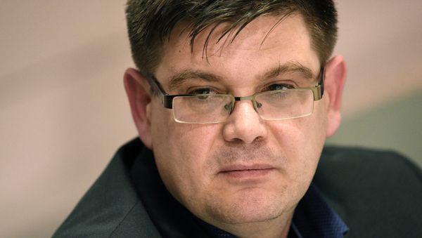 Picture taken on December 14, 2016 shows Andrej Holm, politician of the Die Linke (The Left) left-wing party and Berlin's state secretary for housing, during a press conference in Berlin. - Sputnik International