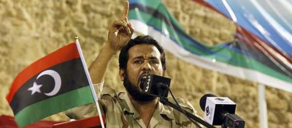 Libya former rebels' Tripoli military commander Abdel Hakim Belhaj delivers his speech during a gathering against ousted Moammar Gadhafi on the Green Square renamed Martyrs Square in Tripoli, Libya, Friday, Sept. 9, 2011. Libya former rebels' Tripoli military commander Abdel Hakim Belhaj delivers his speech during a gathering against ousted Moammar Gadhafi on the Green Square renamed Martyrs Square in Tripoli, Libya, Friday, Sept. 9, 2011. - Sputnik International