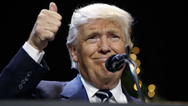 In this Dec. 13, 2016 file photo, President-elect Donald Trump gestures while speaking at a rally in West Allis, Wis. Donald Trump says America cannot let Israel be treated with such total disdain and disrespect. - Sputnik International