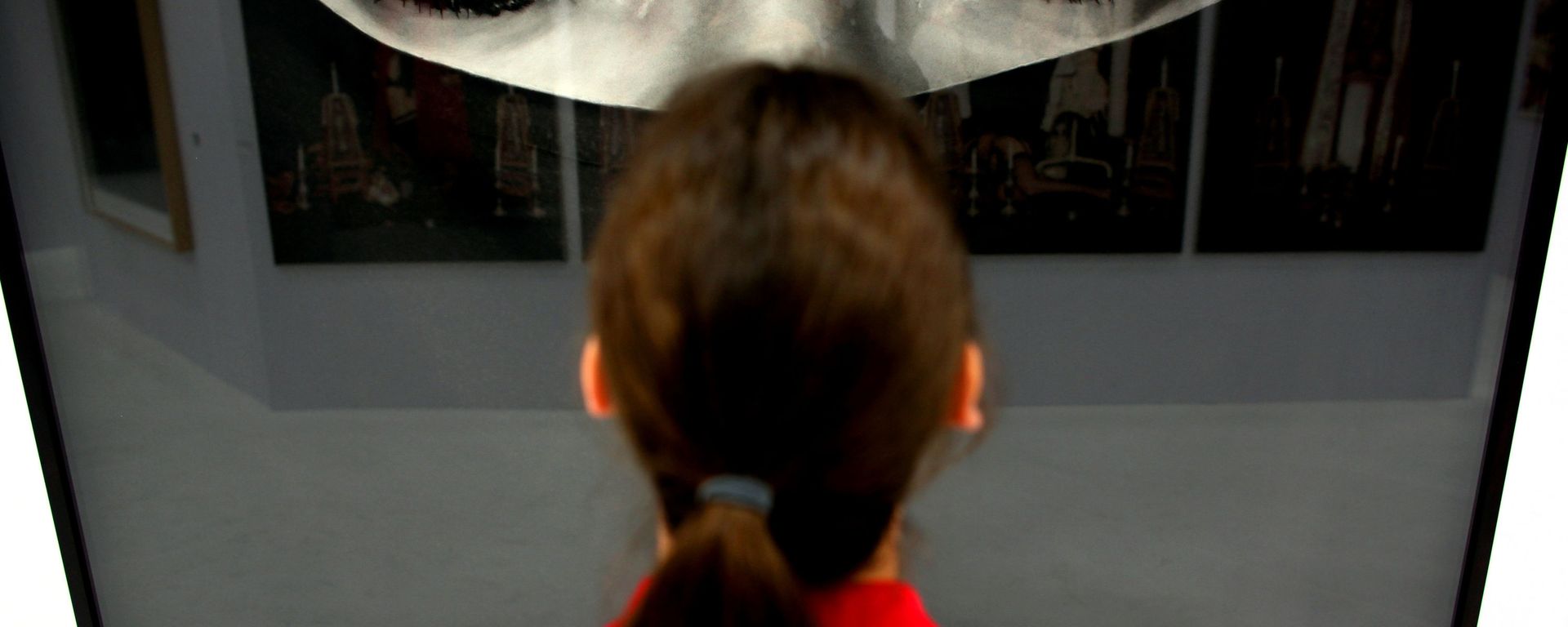A woman looks at the work Burka by US artist Robert Longo at the booth of the gallery Hans Mayer on April 12, 2011 at the Art Cologne art fair in Cologne, western Germany. Around 200 international galleries will be showcasing Classic Modernism, Post-War and Contemporary art during the fair running until April 17, 2011.  - Sputnik International, 1920, 17.10.2021
