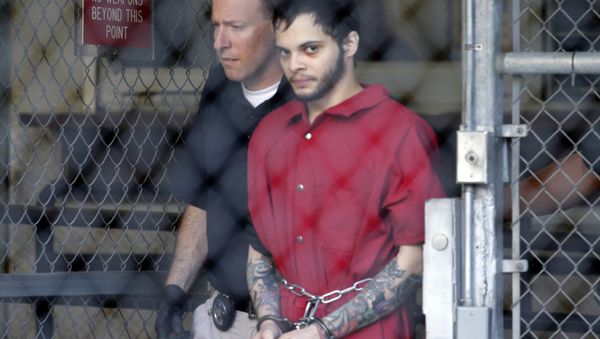 Esteban Santiago, right, leaves the Broward County jail for a hearing in federal court in Fort Lauderdale, Fla - Sputnik International