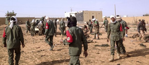 Soldiers attend to wounded and casualties in the aftermath of a suicide bomb attack who ripped through a camp grouping former rebels and pro-government militia in troubled northern Mali left 40 people dead on January 18, 2017 in Gao. Soldiers attend to wounded and casualties in the aftermath of a suicide bomb attack who ripped through a camp grouping former rebels and pro-government militia in troubled northern Mali left 40 people dead on January 18, 2017 in Gao. - Sputnik International