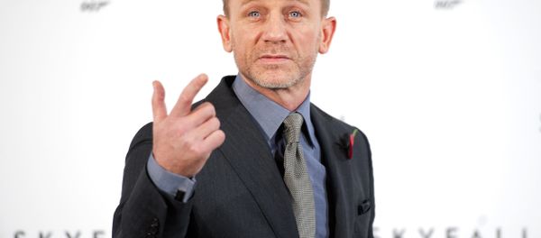 British actor Daniel Craig gestures as he poses for photographers at a photocall to announce the start of production of the 23rd film in the James Bond series; 'Skyfall', in central London on November 3, 2011. - Sputnik International