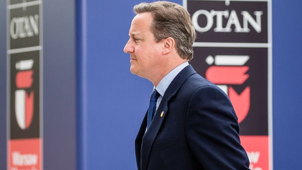Then Prime Minister of Great Britain David Cameron arrives at the Warsaw Stadium entrance for the second day of NATO summit in Warsaw, Poland on July 9, 2016. - Sputnik International