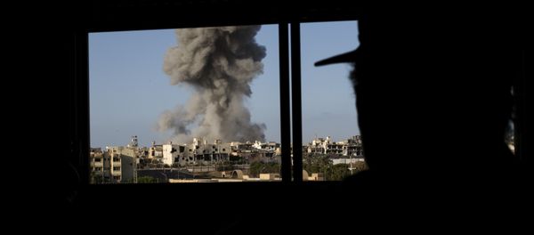 Smoke rise after an airstrike on the District 3 of Sirte, the last stronghold of Islamic State (IS) (File) - Sputnik International