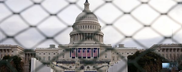The U.S. Capitol building is seen behind a security fence in Washington ahead of the 2017 Presidential Inauguation. The U.S. Capitol building is seen behind a security fence in Washington ahead of the 2017 Presidential Inauguation. - Sputnik International