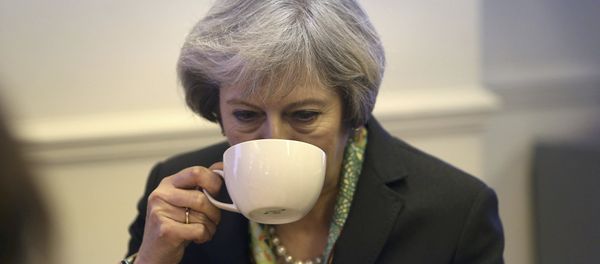 Britain's Prime Minister Theresa May visits the Wellbeing Centre which provides support to people recovering from mental health needs, in Aldershot, Hampshire, January 9, 2017. - Sputnik International