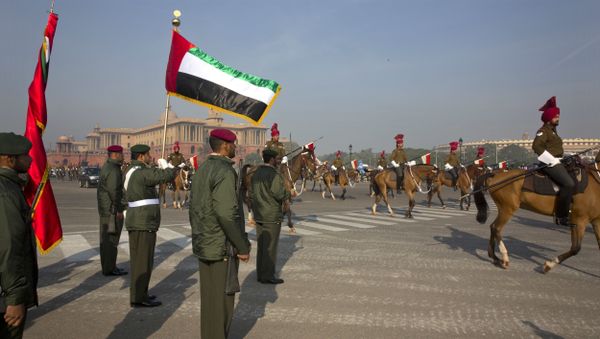 United Arab Emirates, UAE, armed forces soldiers, left, stand in attention as horse-mounted Indian presidential bodyguards march by during the rehearsals for the Republic Day parade at Rajpath in New Delhi, India, Friday, Jan. 20, 2017 - Sputnik International