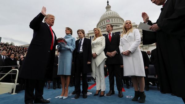 U.S. President Donald Trump takes the oath of office as his wife Melania holds the bible and his children Barron, Ivanka, Eric and Tiffany watch as U.S. Supreme Court Chief Justice John Roberts (R) administers the oath during inauguration ceremonies swearing in Trump as the 45th president of the United States on the West front of the U.S. Capitol in Washington, DC, U.S., January 20, 2017 U.S. President Donald Trump takes the oath of office as his wife Melania holds the bible and his children Barron, Ivanka, Eric and Tiffany watch as U.S. Supreme Court Chief Justice John Roberts (R) administers the oath during inauguration ceremonies swearing in Trump as the 45th president of the United States on the West front of the U.S. Capitol in Washington, DC, U.S., January 20, 2017 - Sputnik International