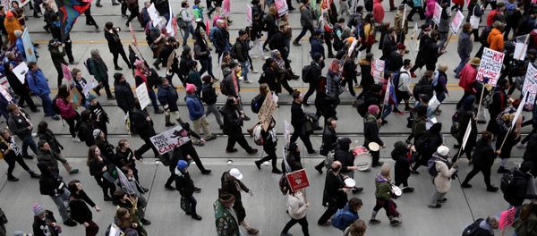 People march in protest to U.S. President Donald Trump's inauguration in Seattle, Washington, U.S. January 20, 2017 People march in protest to U.S. President Donald Trump's inauguration in Seattle, Washington, U.S. January 20, 2017 - Sputnik International