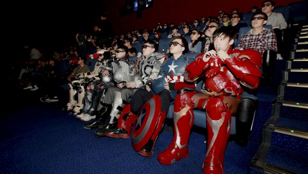 A group of fans dressed in homemade replica armour of Avengers: Age of Ultron movie characters, Iron Man, Captain America and Thor, watch the film in a theatre in Changchun, Jilin province, China on May 16, 2015 A group of fans dressed in homemade replica armour of Avengers: Age of Ultron movie characters, Iron Man, Captain America and Thor, watch the film in a theatre in Changchun, Jilin province, China on May 16, 2015 - Sputnik International