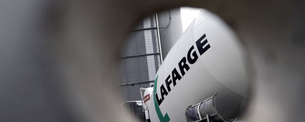 A picture shows the logo on a cement mixer of French cement company Lafarge at one of its plants on April 7, 2014 in Paris A picture shows the logo on a cement mixer of French cement company Lafarge at one of its plants on April 7, 2014 in Paris - Sputnik International