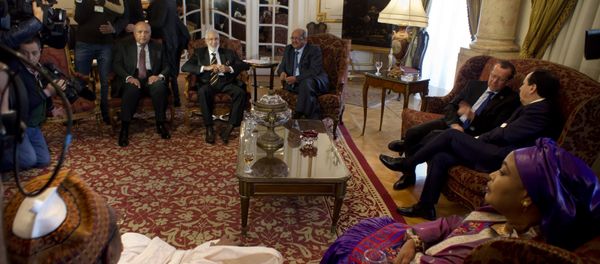 Libyan Foreign Minister, Mohamed Taher Siala, top center, attends a ministerial meeting of countries neighboring Libya which include Egypt, Tunisia, Algeria, Sudan, Niger and Chad, as well as United Nations envoy, Martin Kobler, third right, in Cairo, Egypt, Saturday, Jan. 21, 2017 - Sputnik International