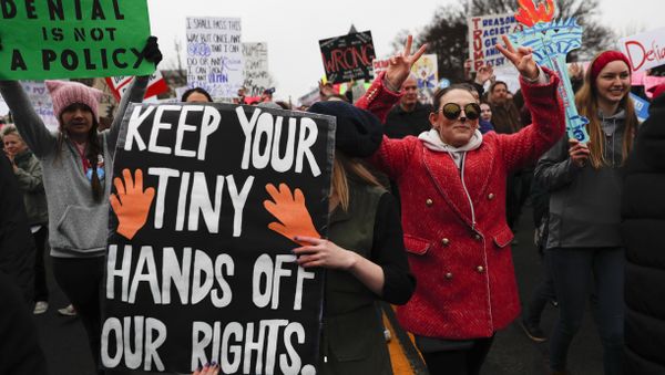 Protesters head towards the White House for the Women's March on Washington during the first full day of Donald Trump's presidency, Saturday, Jan. 21, 2017 in Washington. - Sputnik International