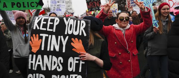 Protesters head towards the White House for the Women's March on Washington during the first full day of Donald Trump's presidency, Saturday, Jan. 21, 2017 in Washington. Protesters head towards the White House for the Women's March on Washington during the first full day of Donald Trump's presidency, Saturday, Jan. 21, 2017 in Washington. - Sputnik International