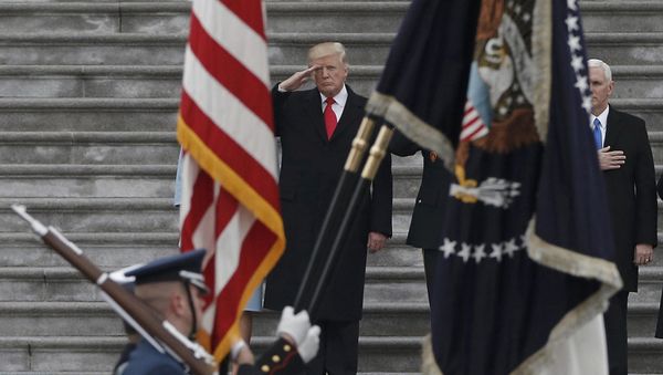 Newly inaugurated U.S. President Donald Trump salutes as he presides over a military parade during Trump's swearing ceremony in Washington, U.S., January 20, 2017 Newly inaugurated U.S. President Donald Trump salutes as he presides over a military parade during Trump's swearing ceremony in Washington, U.S., January 20, 2017 - Sputnik International