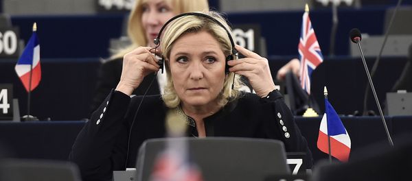 French Front National (National Front - FN) far-right party's President, European MP and candidate for the 2017 French Presidential elections Marine Le Pen adjusts her headphones as she attends a debate on the conclusions of the European Council meeting on October 20-21 at the European Parliament in Strasbourg, eastern France, on October 26, 2016 - Sputnik International