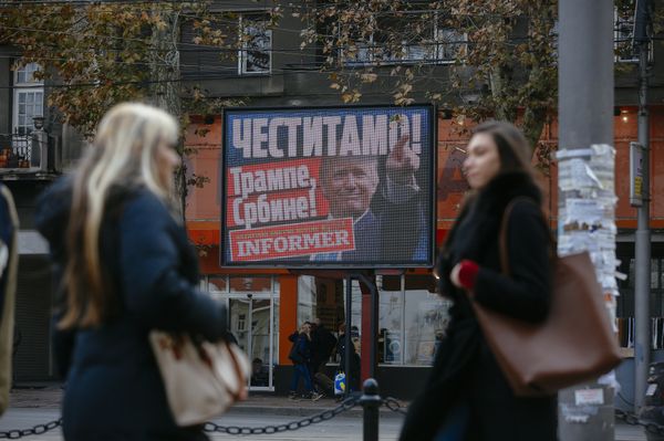Pedestrians walk by a billboard picturing US President-elect Donald Trump with an inscrpition that translates as Congratulations! Trump, Serb! published by Serbian daily newspaper in Belgrade on November 10, 2016 Pedestrians walk by a billboard picturing US President-elect Donald Trump with an inscrpition that translates as Congratulations! Trump, Serb! published by Serbian daily newspaper in Belgrade on November 10, 2016 - Sputnik International