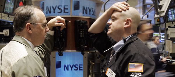 A pair of traders confer at a phone post on the floor of the New York Stock Exchange, Thursday, Jan. 3, 2008 - Sputnik International