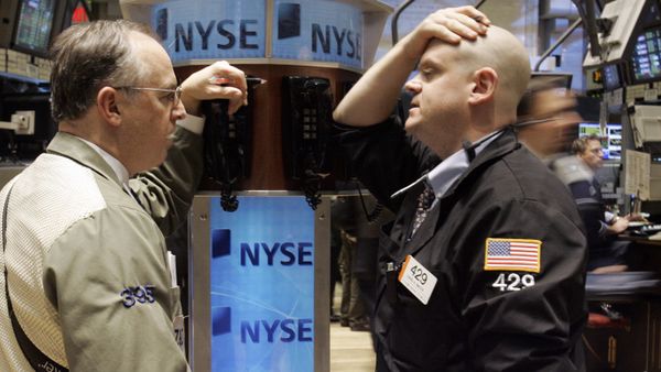 A pair of traders confer at a phone post on the floor of the New York Stock Exchange, Thursday, Jan. 3, 2008 A pair of traders confer at a phone post on the floor of the New York Stock Exchange, Thursday, Jan. 3, 2008 - Sputnik International