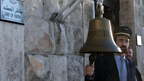 A Syrian railway station employee rings the bell (file) A Syrian railway station employee rings the bell (file) - Sputnik International