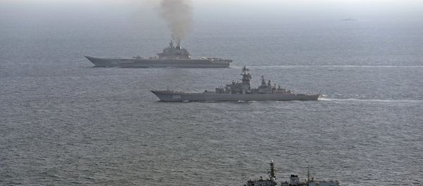 HMS St Albans (front) monitors Russian warships Pyotr Velikiy and the Admiral Kuznetsov (rear) as they pass close to UK territorial waters HMS St Albans (front) monitors Russian warships Pyotr Velikiy and the Admiral Kuznetsov (rear) as they pass close to UK territorial waters - Sputnik International