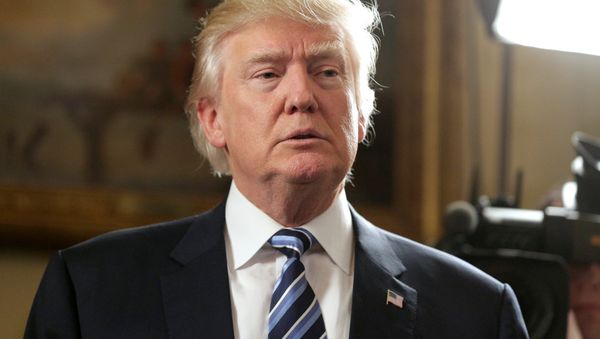 US President Donald Trump speaks during the Inaugural Law Enforcement Officers and First Responders Reception in the Blue Room of the White House in Washington, US, January 22, 2017. - Sputnik International