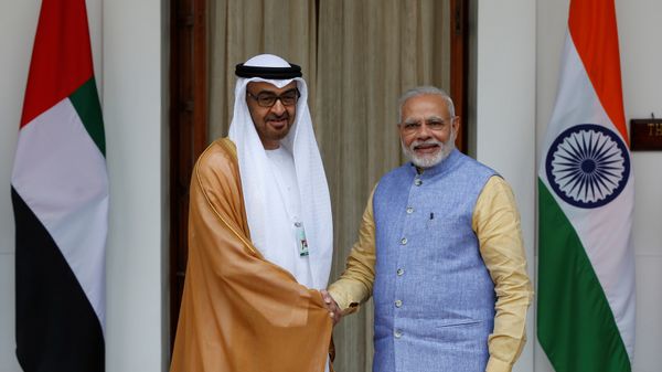 Sheikh Mohammed bin Zayed al-Nahyan, Crown Prince of Abu Dhabi and UAE's deputy commander-in-chief of the armed forces shakes hands with India's Prime Minister Narendra Modi (R) during a photo opportunity ahead of their meeting at Hyderabad House in New Delhi, India, January 25, 2017. - Sputnik International
